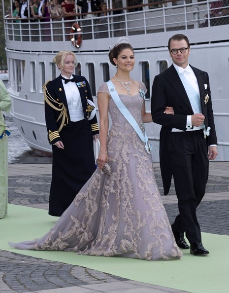 Princesa da Suécia Victória (irmã da noiva) e Daniel.